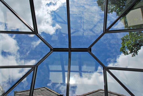 Bi folding doors on this modern orangery gives this property a light and airy feel